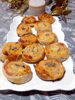 Una foto de Rollitos de jamón y queso