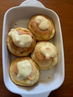 A picture of Cheesy muffin with yoghurt.
