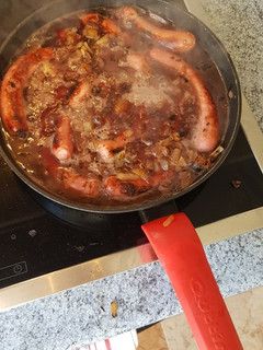 Una foto de Salchichas de pavo al vino tinto