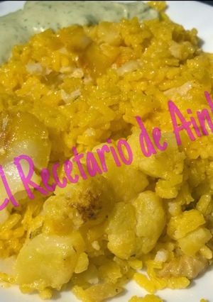Una foto de Arroz con bacalao y coliflor