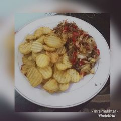 Fried potatoes and cabbage sauces A picture of Fried potatoes and cabbage sauces.