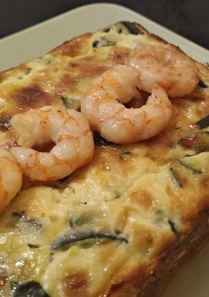 Foto principal de Pastel de puerro y calabacín con gambas