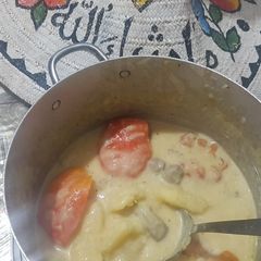 A picture of Cassava with coconut and meat.