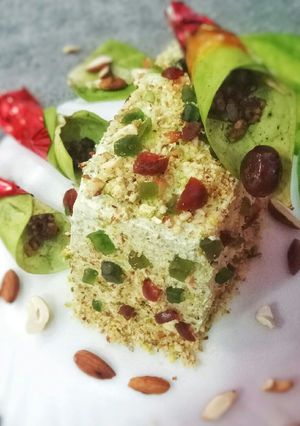 A picture of Pistachio and Thandai Cake with Paan and Gulkand Frosting.