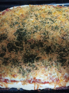 Una foto de Pizza cuatro quesos