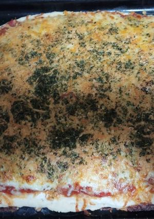 Una foto de Pizza cuatro quesos