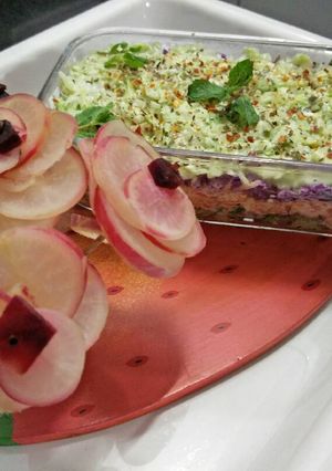 A picture of Layered salad.