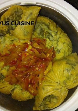 A picture of Spinach Moi Moi.