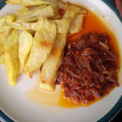 A picture of Fried Potatoes and Pepper Sauce.