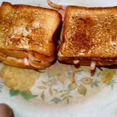 A picture of Onion masala toast.