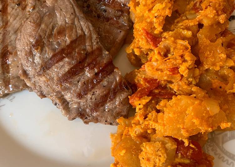 Presa ibérica con revuelto campero