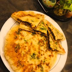 A picture of Whosayna’s Tawa Keema Naan.
