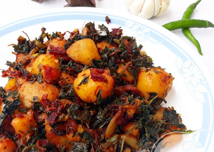 Sauteed baby potatoes with beetroot and amaranth leaves