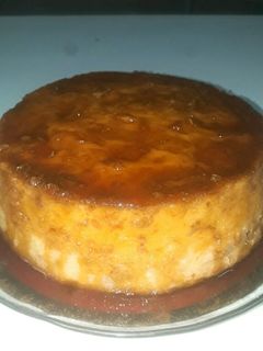 Una foto de Budín de pan con leche en polvo