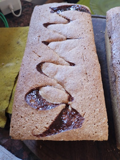 Una foto de Budín de coco y dulce de leche sin manteca