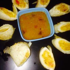 A picture of Dosa pizza roll ups.