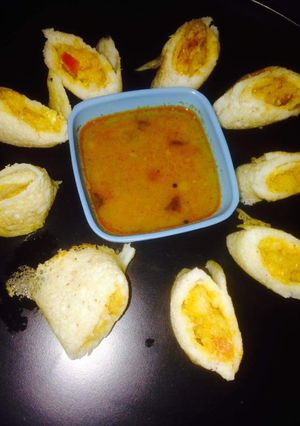 A picture of Dosa pizza roll ups.