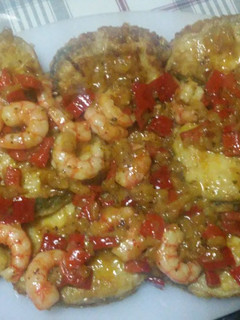 Foto principal de Merluza rebozada con salsa y gambas