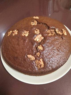 Una foto de Coca de chocolate y nueces