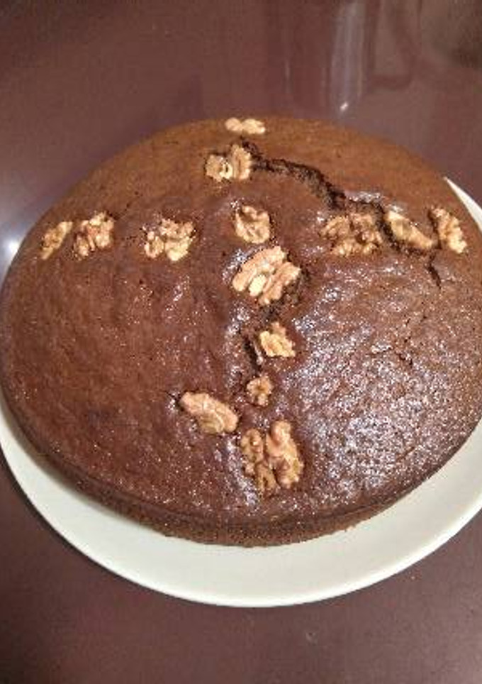 Una foto de Coca de chocolate y nueces