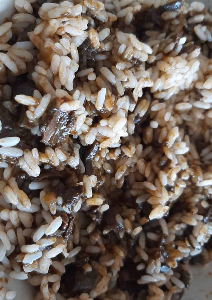 Una foto de Arroz con calamares en su tinta
