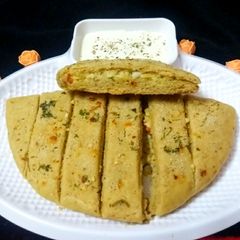 A picture of Stuffed whole wheat garlic bread sticks.