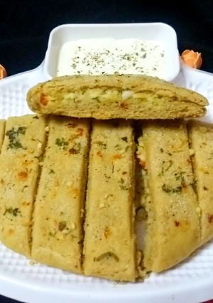 A picture of Stuffed whole wheat garlic bread sticks.