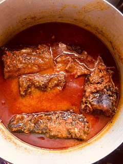 A picture of Palm oil stew with fish🌶🍅🧅.