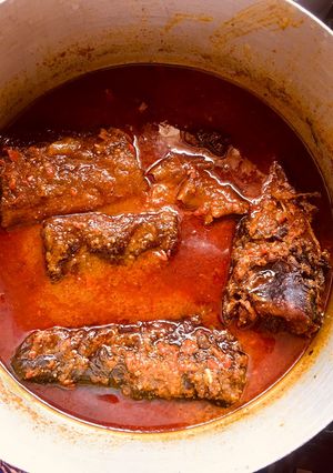 A picture of Palm oil stew with fish🌶🍅🧅.