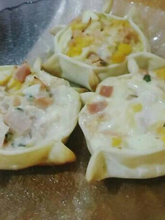 Una foto de Canastitas de jamón, queso y choclo