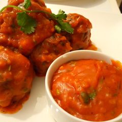 A picture of Meatballs With sauce.