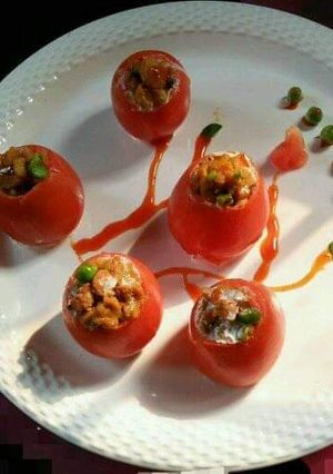 A picture of Stuffed tomatoes steam.