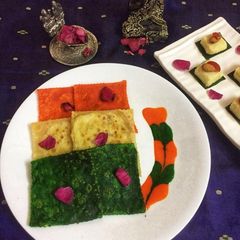 A picture of Tricolour meetha paratha with meetha sauce.