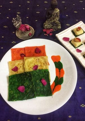 A picture of Tricolour meetha paratha with meetha sauce.