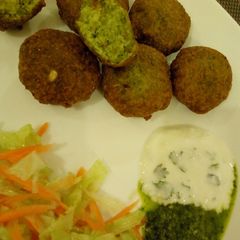 A picture of Spinach & green grams bhajia#endofyearchallenge.