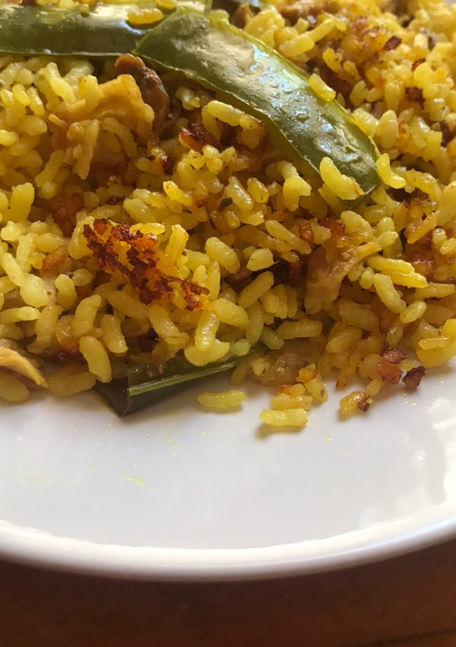 Una foto de Arroz seco en cazuela antigua