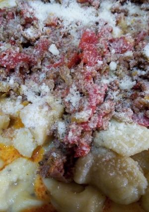 Una foto de Ñoquis caseros con salsa bolognesa