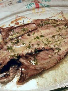 Una foto de Jurel con ajo y perejil al horno