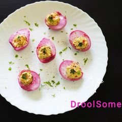Beetroot pickled deviled eggs A picture of Beetroot pickled deviled eggs.