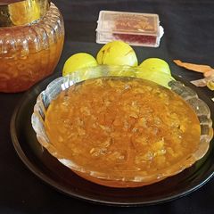 A picture of Amla murabba with jaggery.