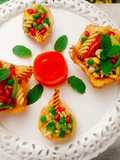 Crispy Edible Diyas filled with Pasta Chat