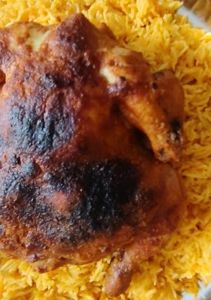 صورة لوصفة دجاج مشوي بالفرن مع كبسة بالطماطم