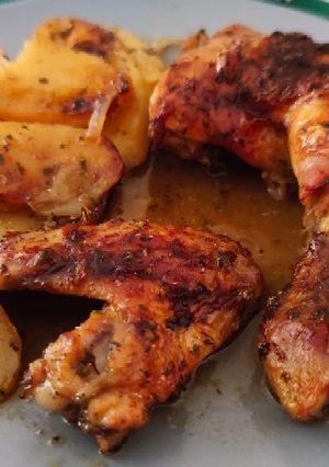 Una foto de Pollo asado con patatas