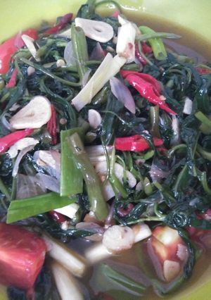 A picture of Stir-fried Kangkung (water spinach).