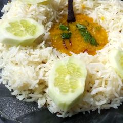 A picture of Zeera rice with Tadka Dal.