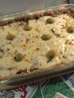 Una foto de Tarta pizza de brócoli con muzzarella y masa integral
