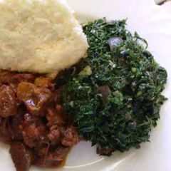 A picture of Ugali spinach+beef fry.