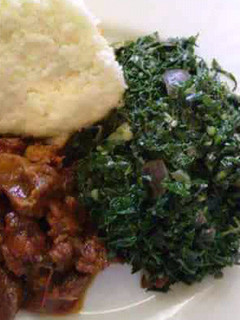 A picture of Ugali spinach+beef fry.