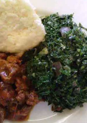 A picture of Ugali spinach+beef fry.