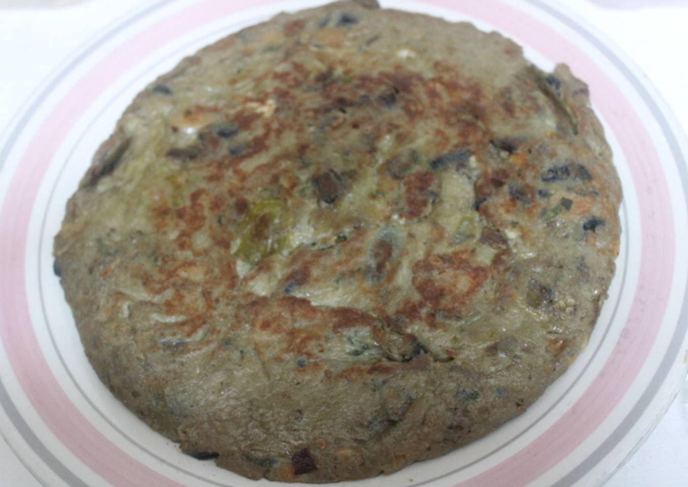 Tortilla de berenjena con cebolla y pimientos
